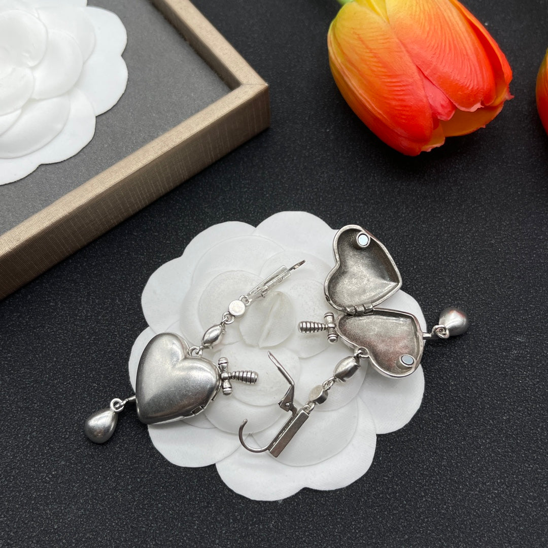 Alexander McQueen Crystal Petal Drop earrings in Silver & Red, detail view 6