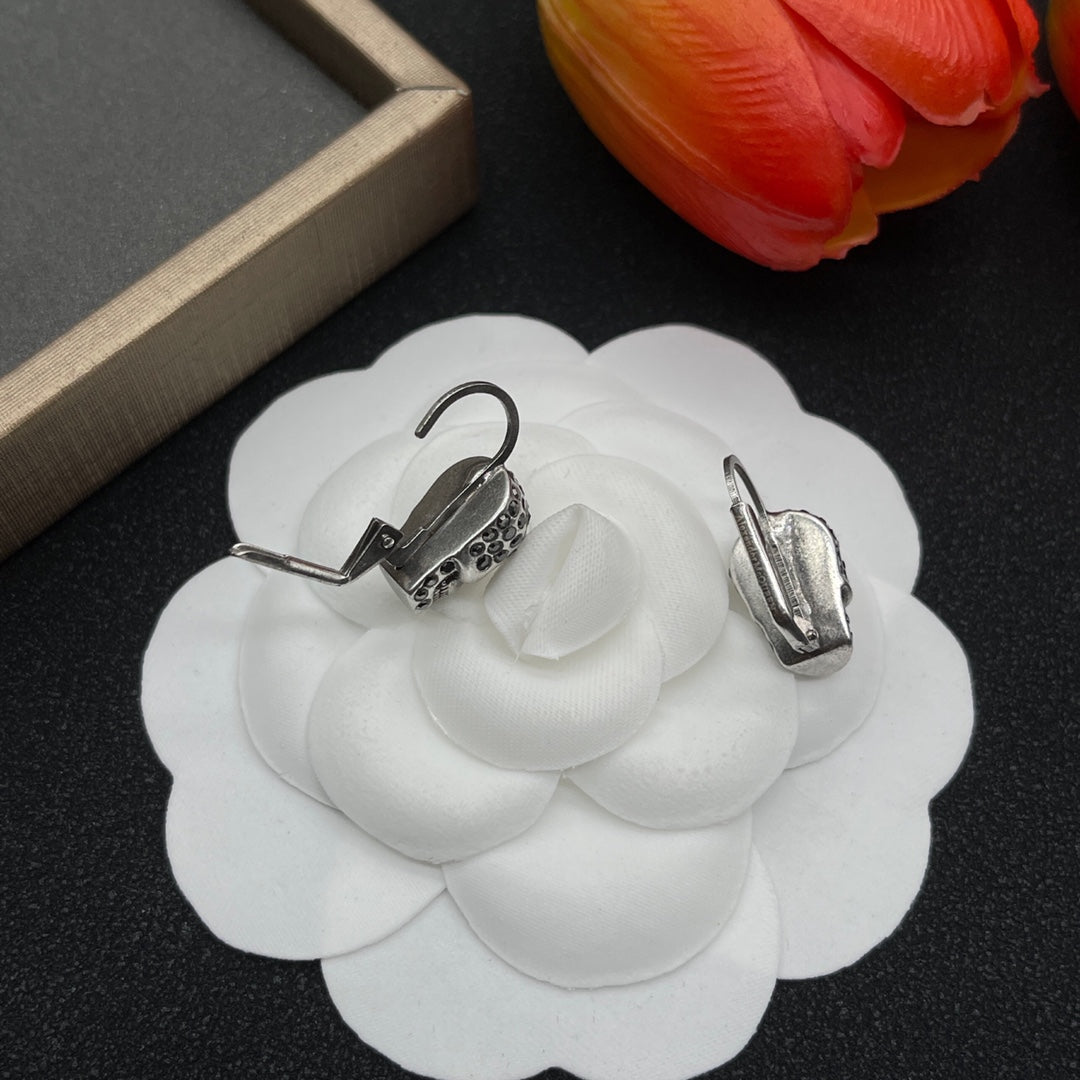Alexander McQueen Compact Logo Stud earrings in Silver Tone, detail view 13