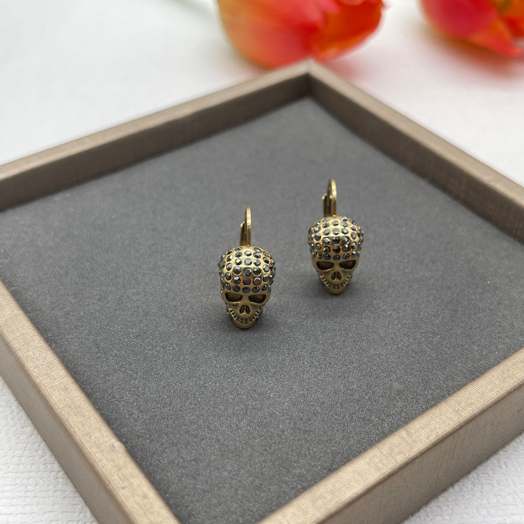 Alexander McQueen Compact Logo Stud earrings in Gold Tone, detail view 3