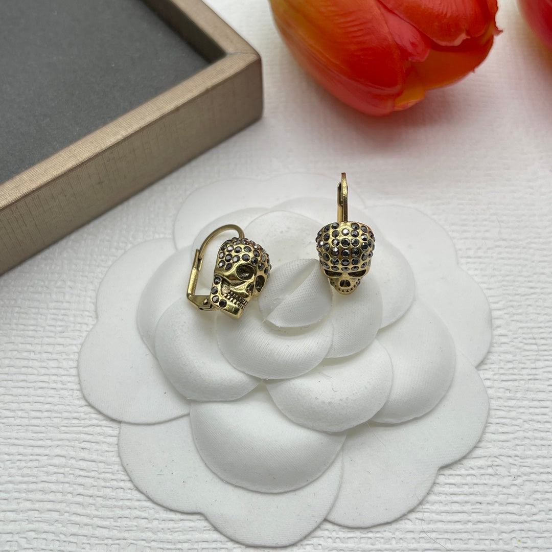 Alexander McQueen Compact Logo Stud earrings in Gold Tone, detail view 4