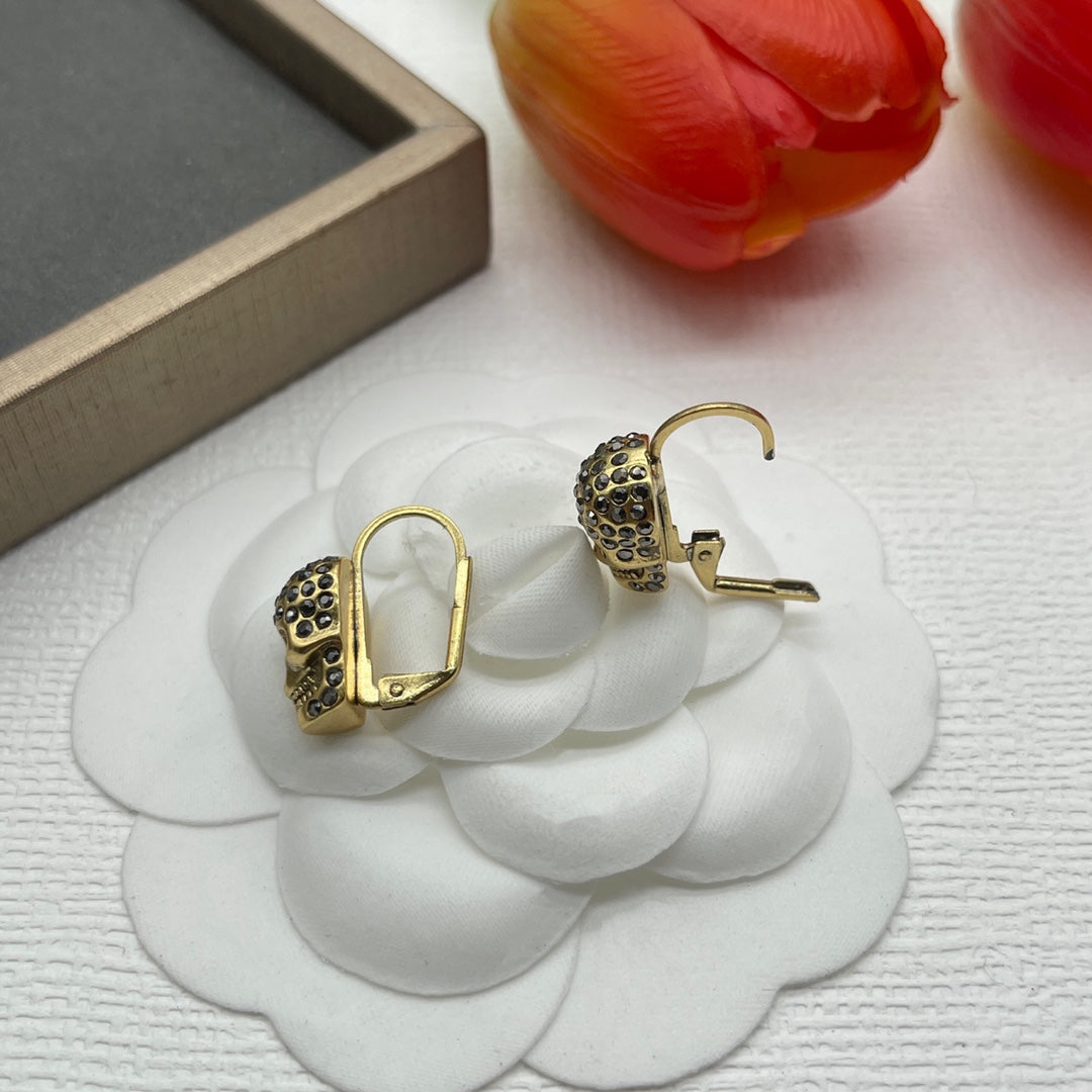 Alexander McQueen Compact Logo Stud earrings in Gold Tone, detail view 5