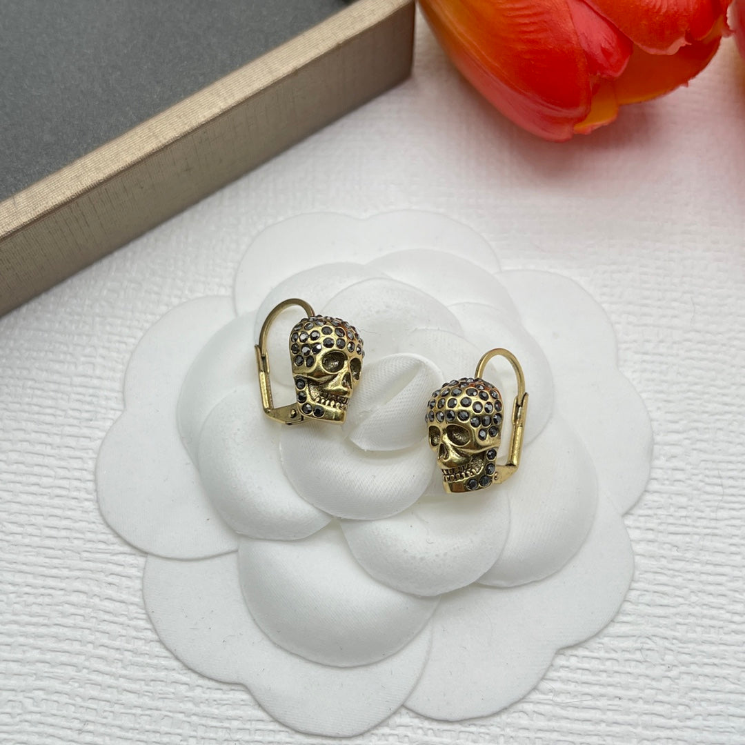 Alexander McQueen Compact Logo Stud earrings in Gold Tone, main view