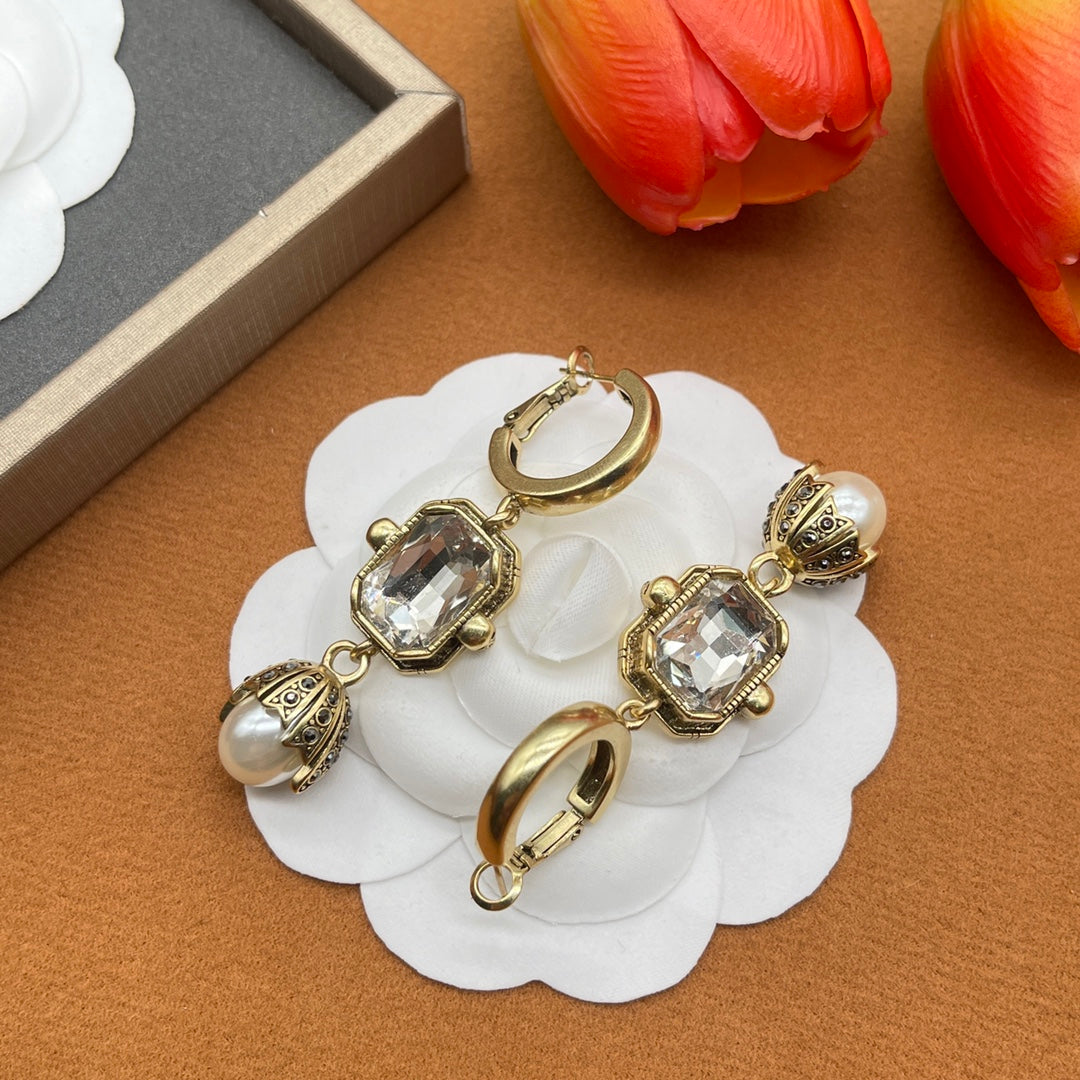 Alexander McQueen Oval Crystal Pearl Drop earrings in Gold Tone, detail view 3