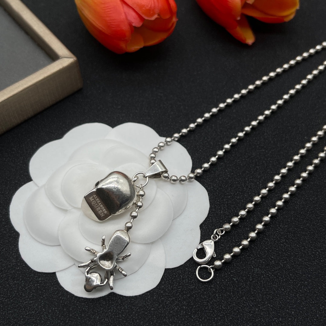 Alexander McQueen Winged Skull Pendant necklace in Silver Tone, detail view 6