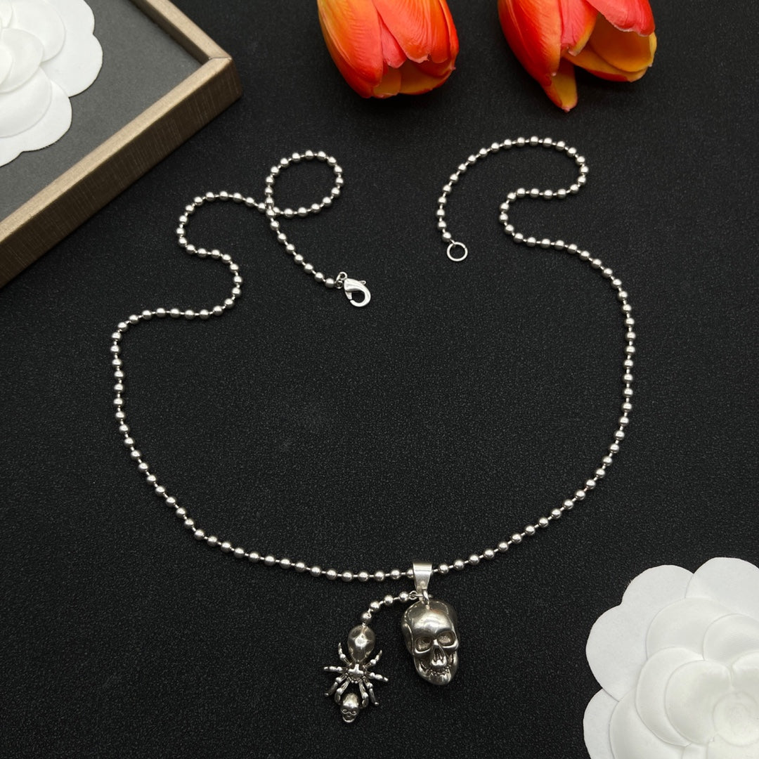 Alexander McQueen Winged Skull Pendant necklace in Silver Tone, detail view 4