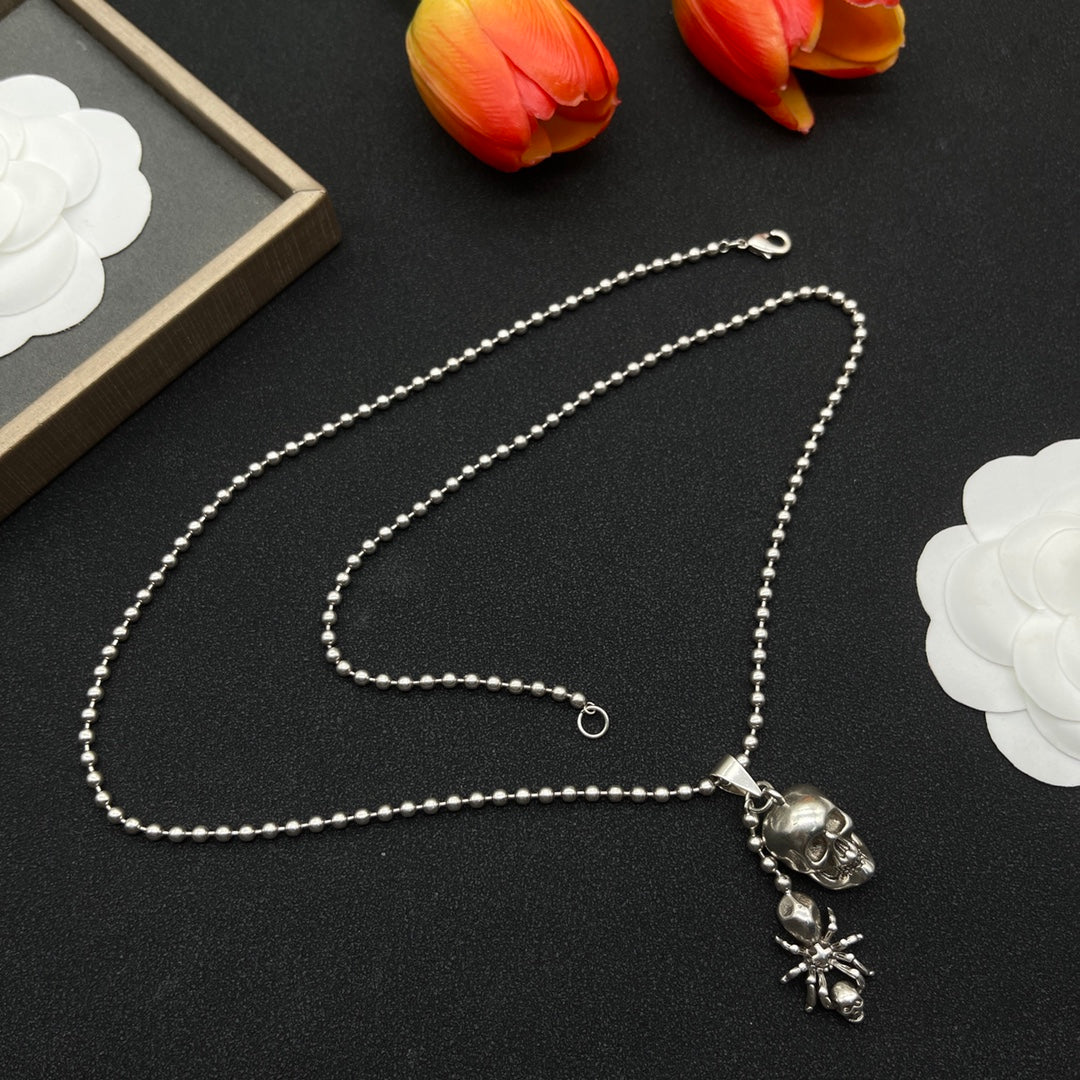 Alexander McQueen Winged Skull Pendant necklace in Silver Tone, detail view 5
