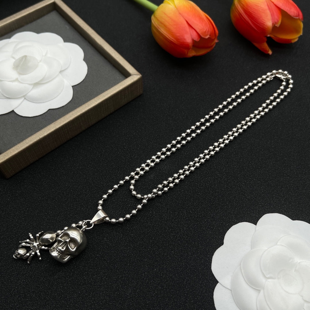 Alexander McQueen Winged Skull Pendant necklace in Silver Tone, detail view 3