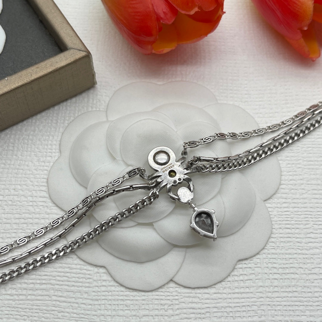 Alexander McQueen Fine Chain Skull bracelet in Silver Tone, detail view 6