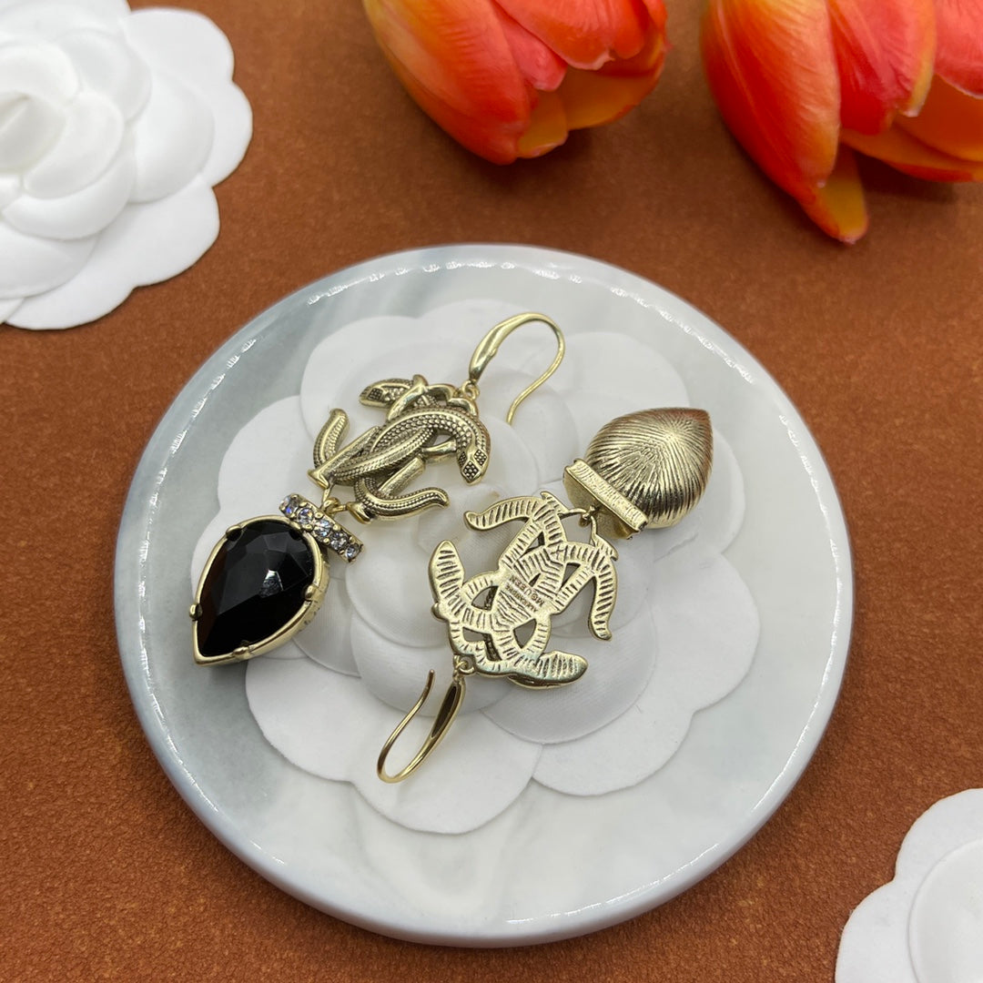 Alexander McQueen Insect Teardrop Crystal earrings in Gold & Black, detail view 40