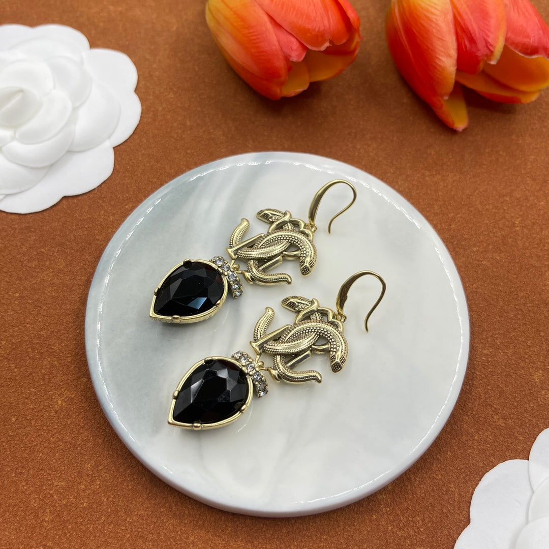 Alexander McQueen Insect Teardrop Crystal earrings in Gold & Black, detail view 37