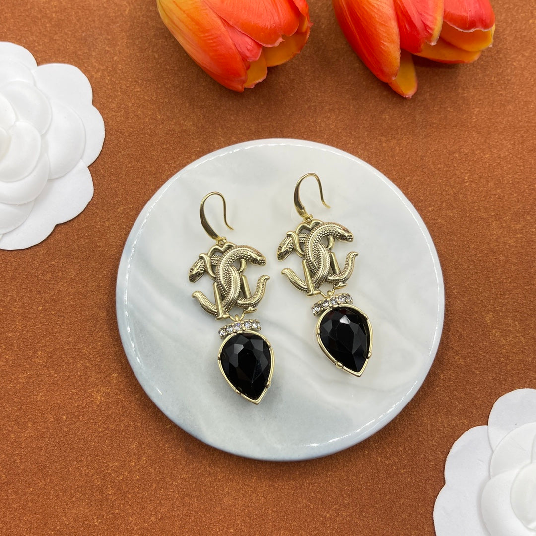 Alexander McQueen Insect Teardrop Crystal earrings in Gold & Black, detail view 36