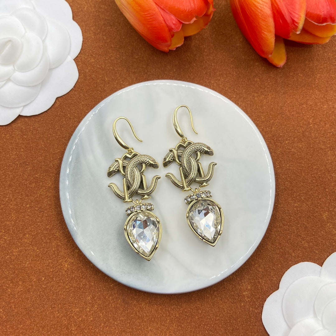 Alexander McQueen Insect Teardrop Crystal earrings in Gold & Clear, detail view 29