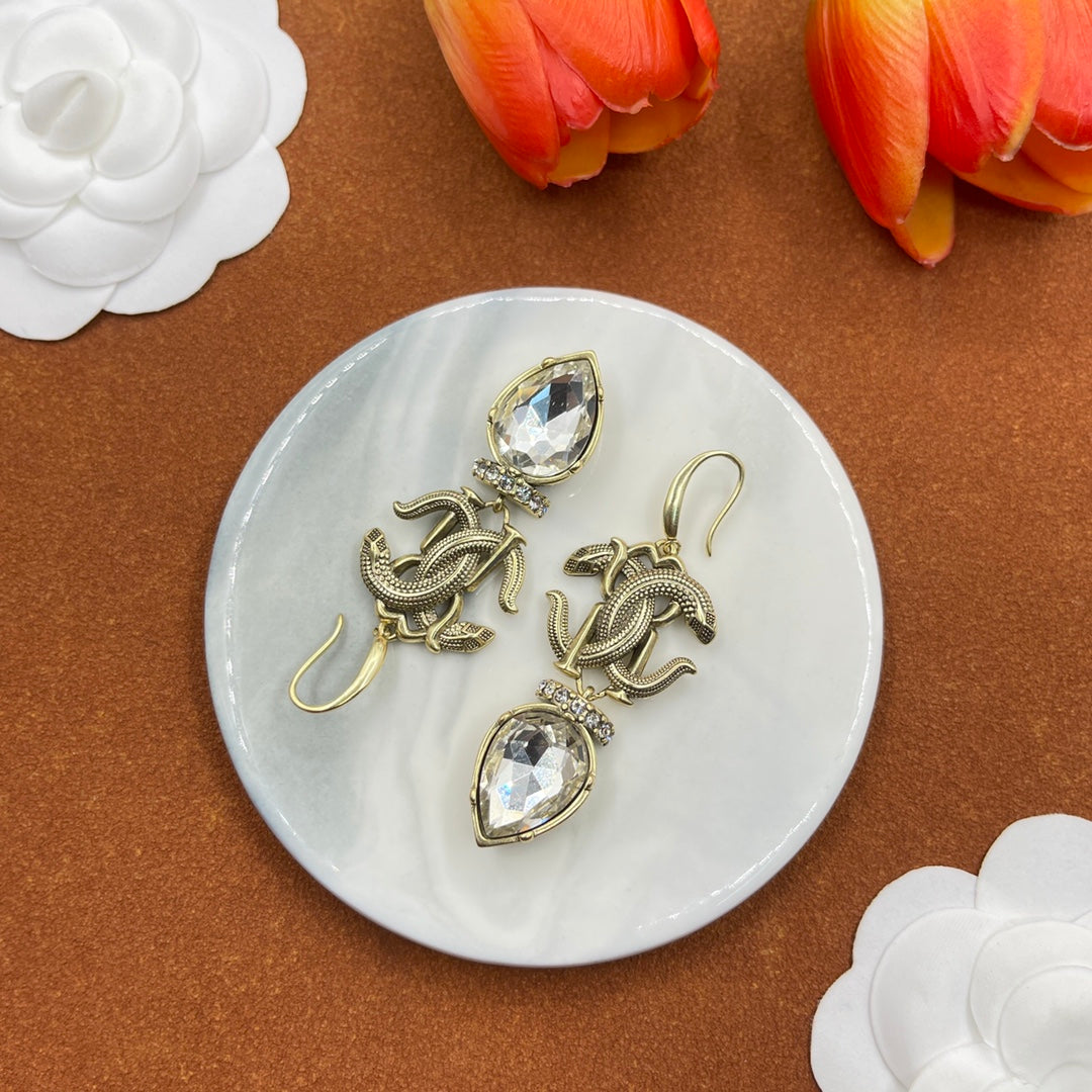 Alexander McQueen Insect Teardrop Crystal earrings in Gold & Clear, detail view 31