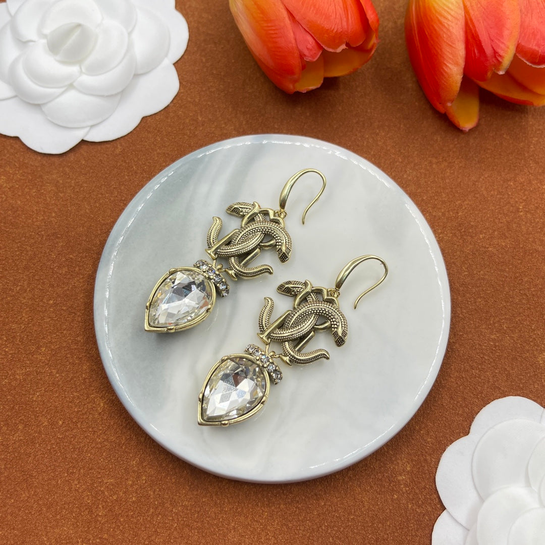 Alexander McQueen Insect Teardrop Crystal earrings in Gold & Clear, detail view 30
