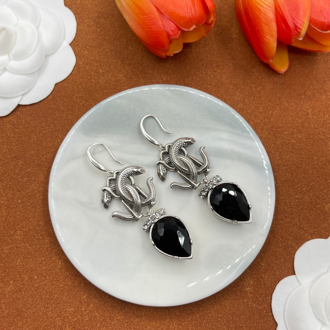 Alexander McQueen Insect Teardrop Crystal earrings in Silver & Black, detail view 16
