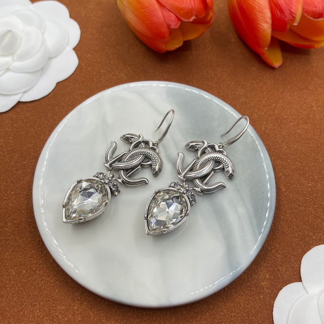 Alexander McQueen Insect Teardrop Crystal earrings in Silver & Clear, detail view 9
