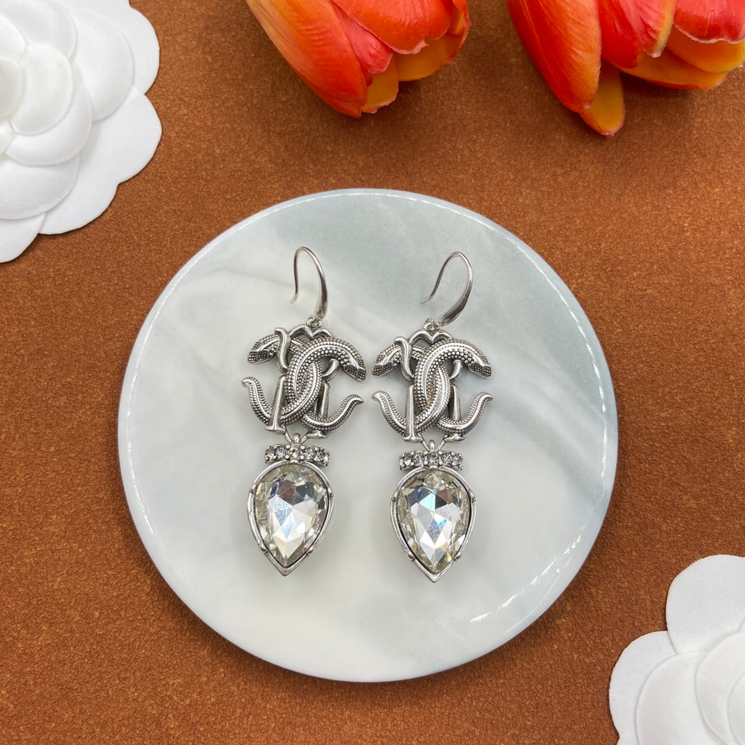 Alexander McQueen Insect Teardrop Crystal earrings in Silver & Clear, detail view 8