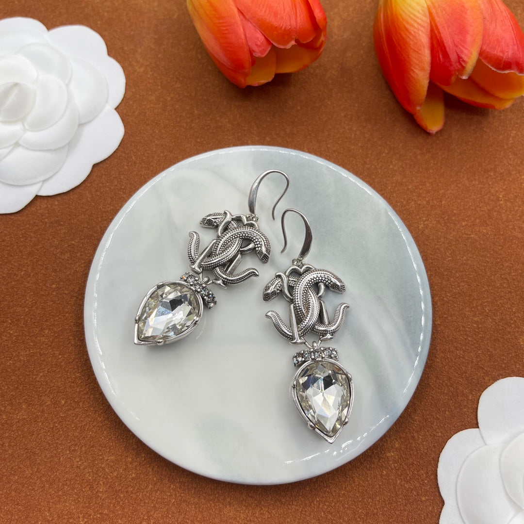Alexander McQueen Insect Teardrop Crystal earrings in Silver & Clear, detail view 10