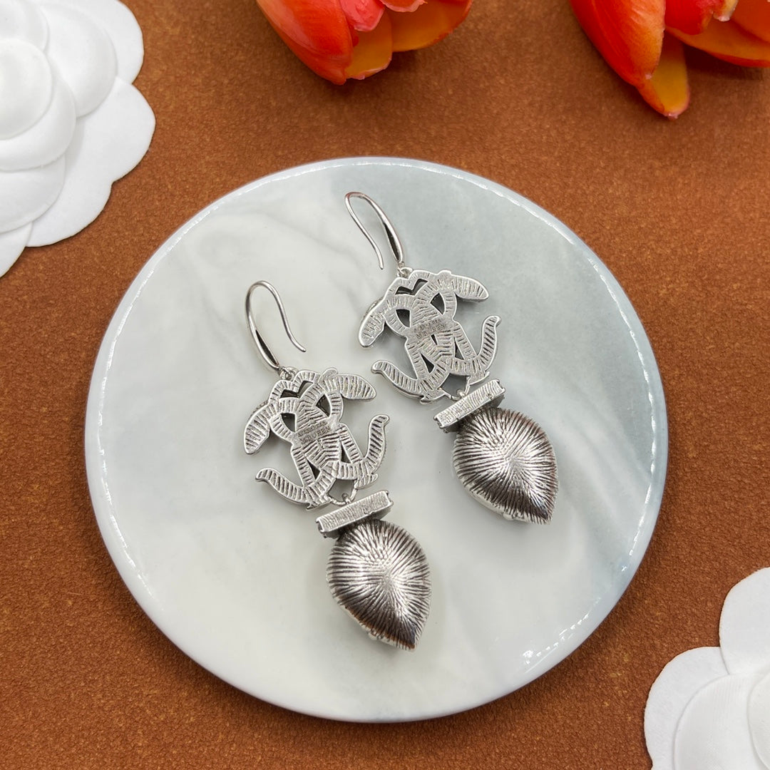 Alexander McQueen Insect Teardrop Crystal earrings in Silver & Clear, detail view 13