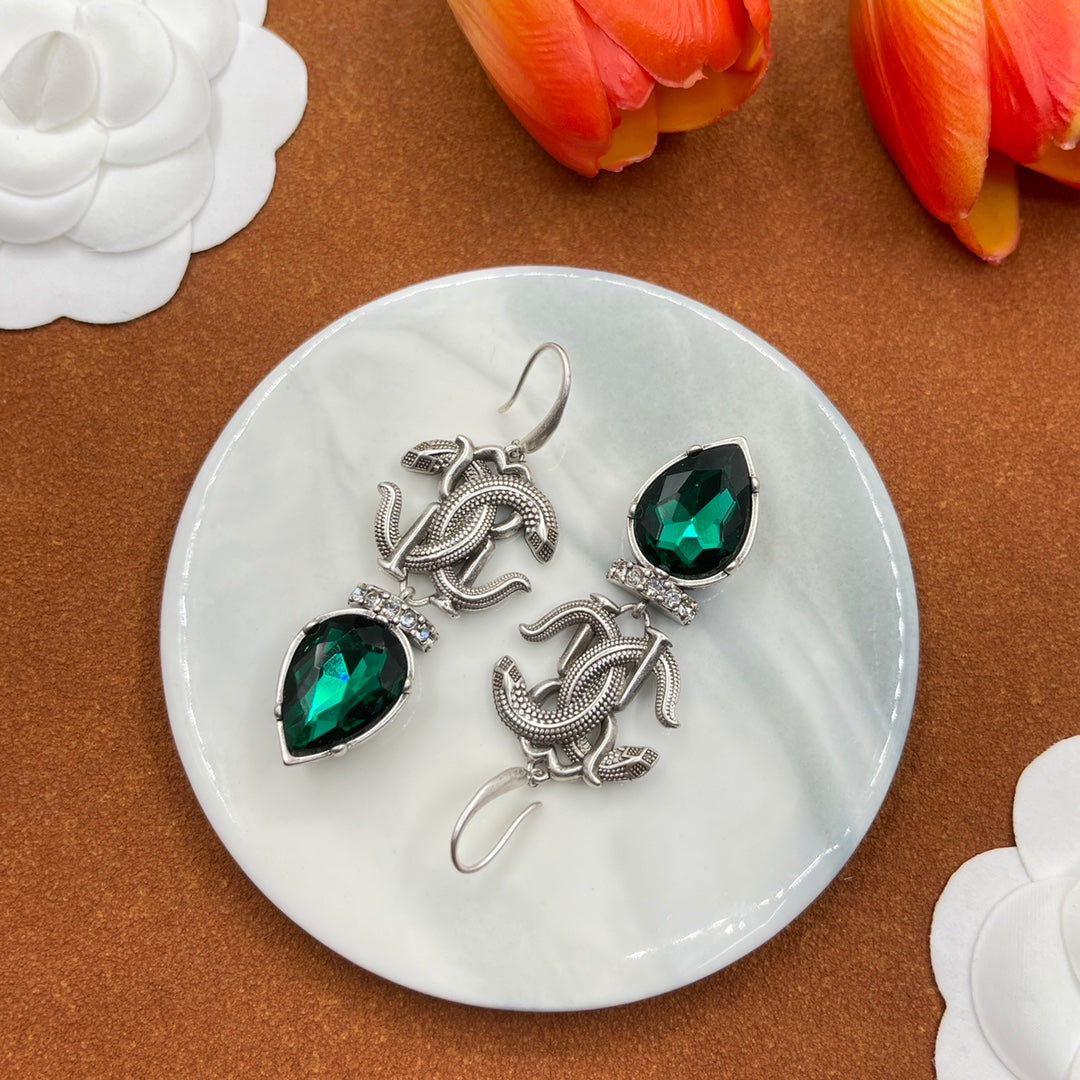 Alexander McQueen Insect Teardrop Crystal earrings in Silver & Green, detail view 4