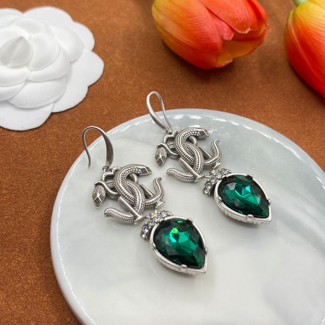 Alexander McQueen Insect Teardrop Crystal earrings in Silver & Green, detail view 3