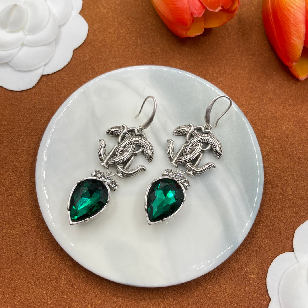 Alexander McQueen Insect Teardrop Crystal earrings in Silver & Green, detail view 2