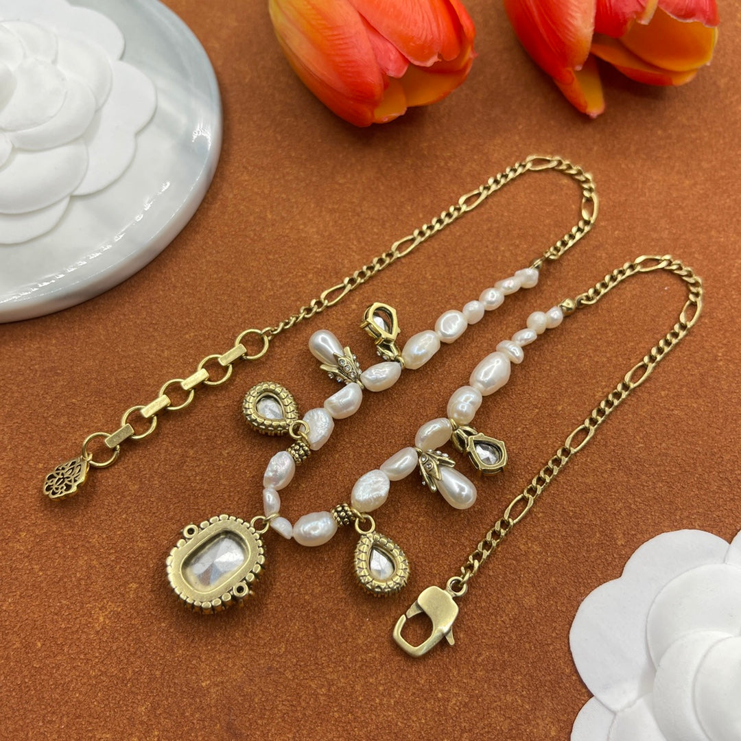 Alexander McQueen Pearl Medallion Station necklace in Gold Tone, detail view 13