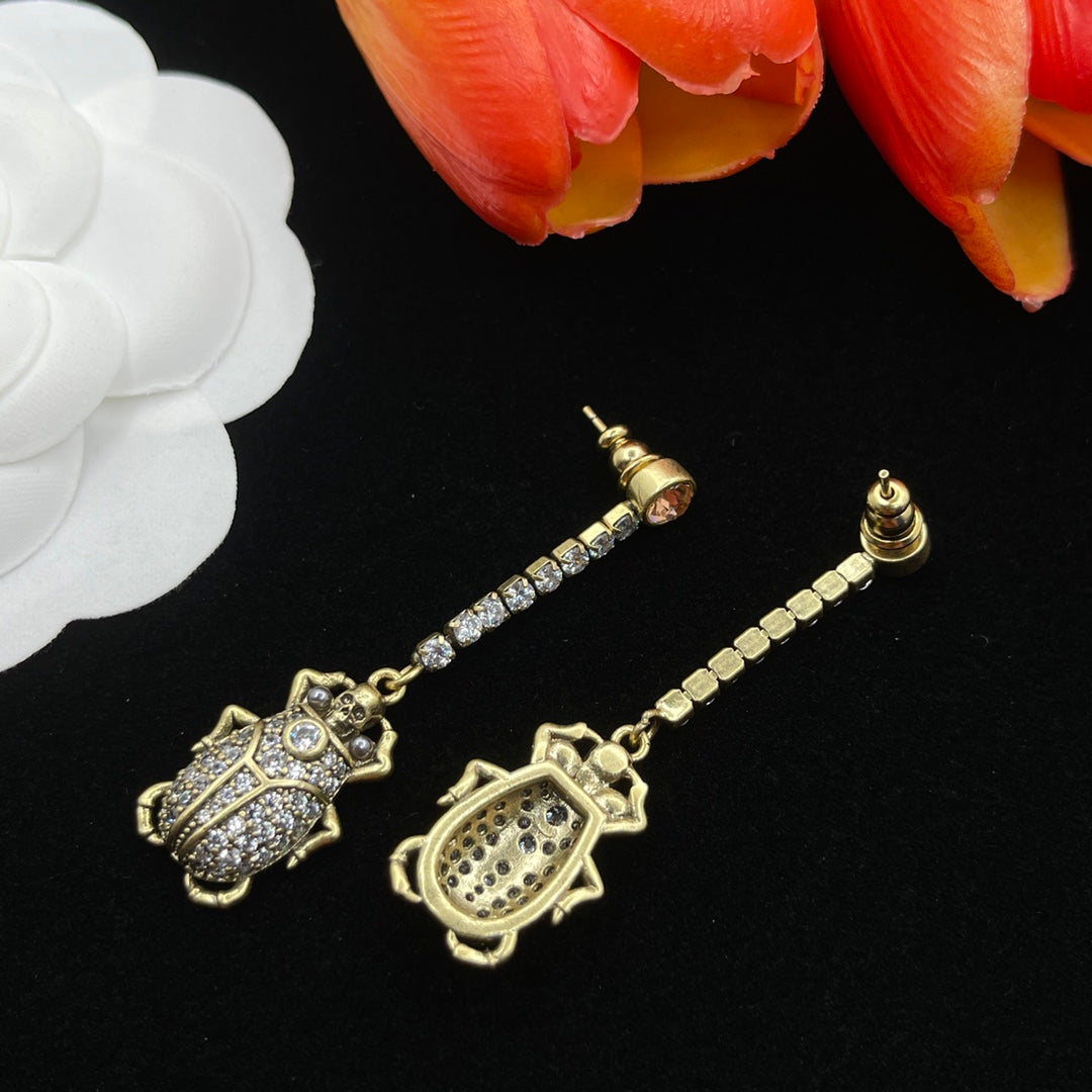 Alexander McQueen Filigree Insect Drop earrings in Gold Tone, detail view 4