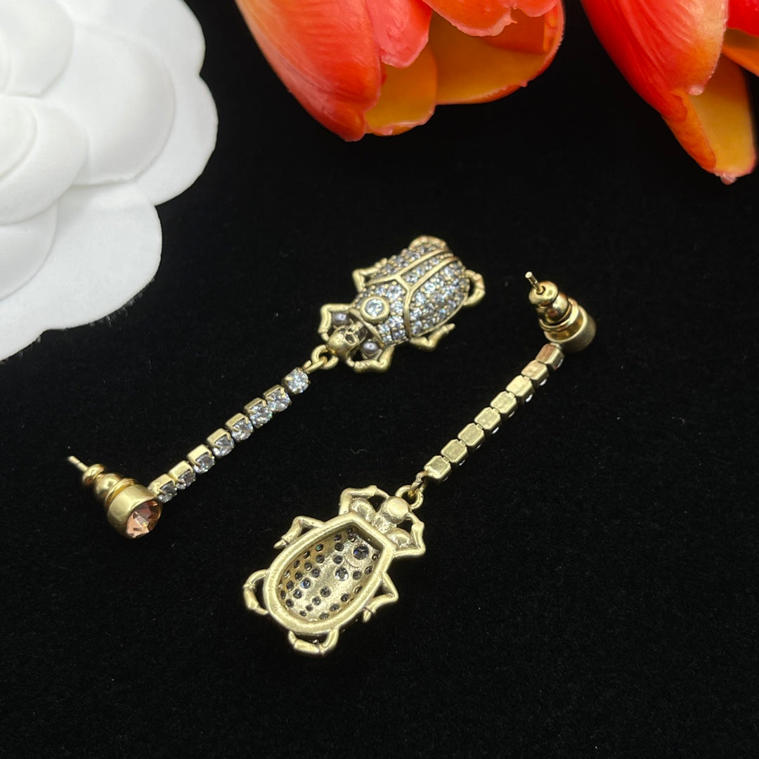 Alexander McQueen Filigree Insect Drop earrings in Gold Tone, detail view 5