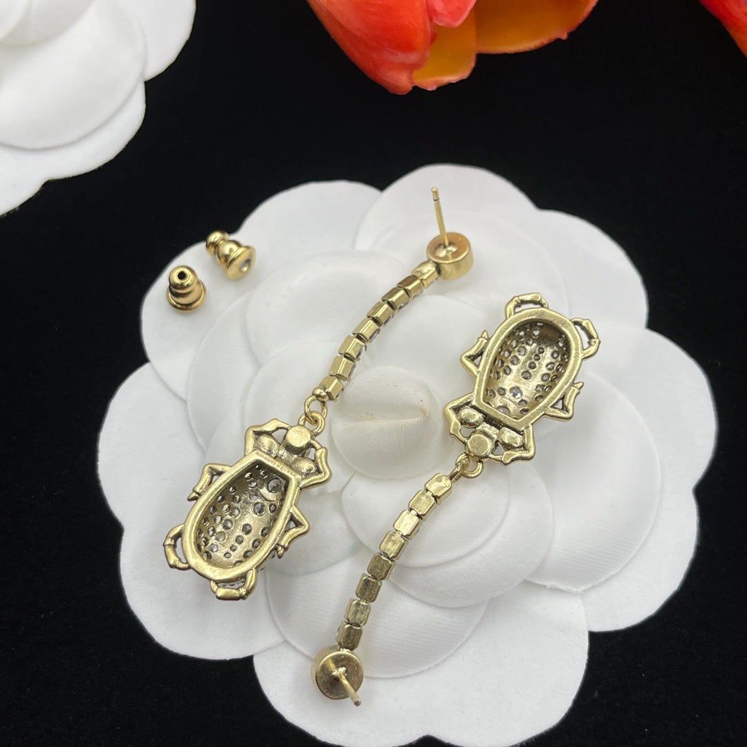 Alexander McQueen Filigree Insect Drop earrings in Gold Tone, detail view 6