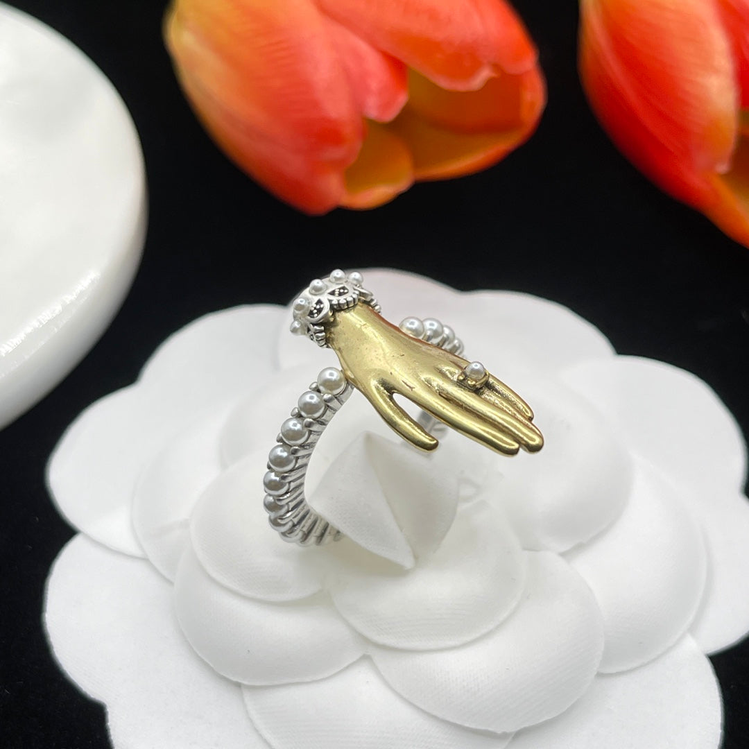 Alexander McQueen Hand Motif Wrap ring in Gold & Silver Tone, main view