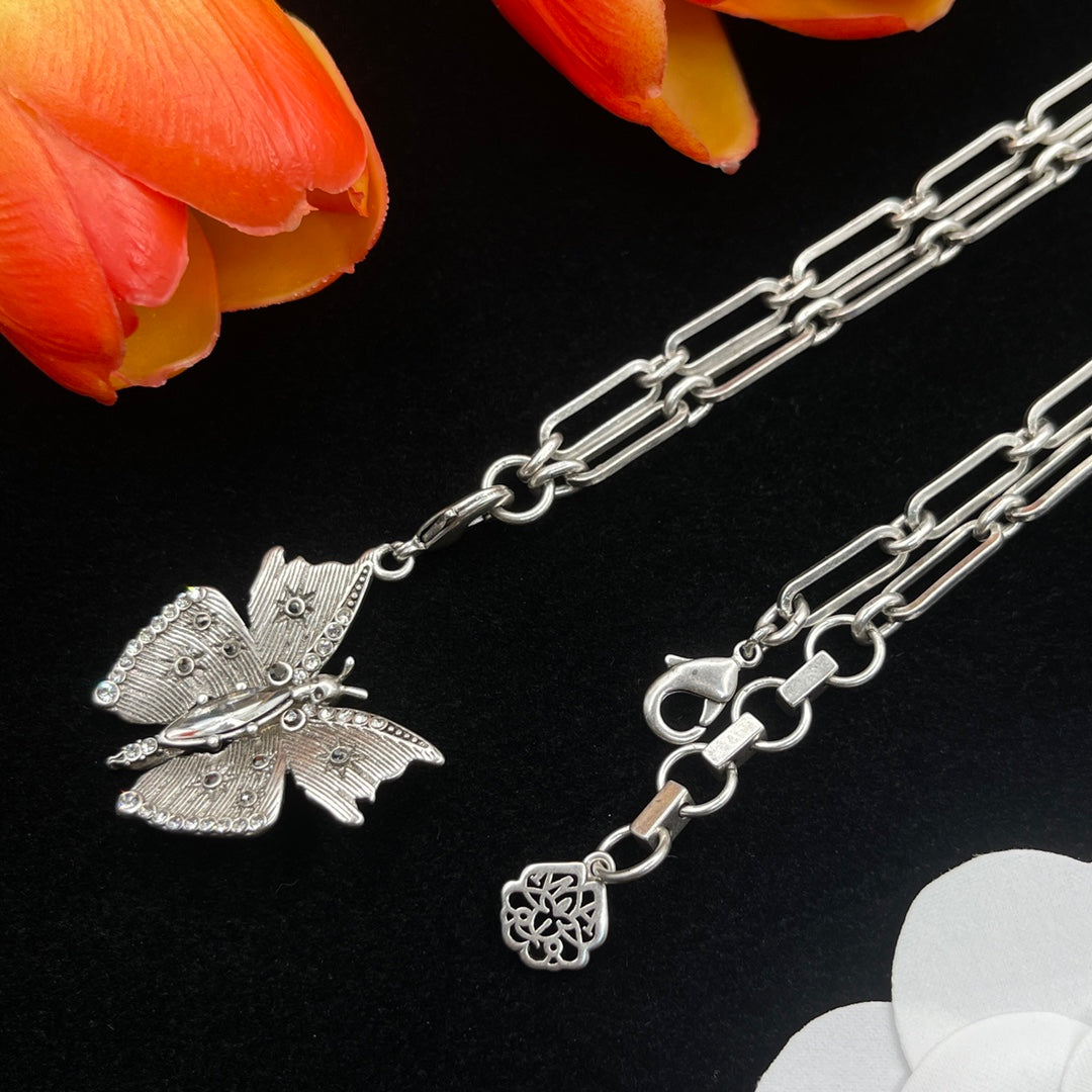 Alexander McQueen Butterfly Charm Chain necklace in Silver Tone, detail view 10