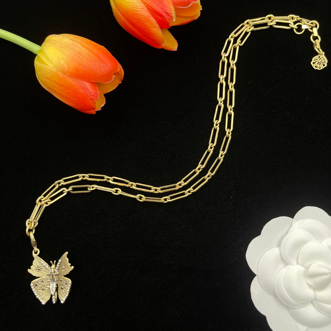 Alexander McQueen Butterfly Charm Chain necklace in Gold Tone, detail view 2