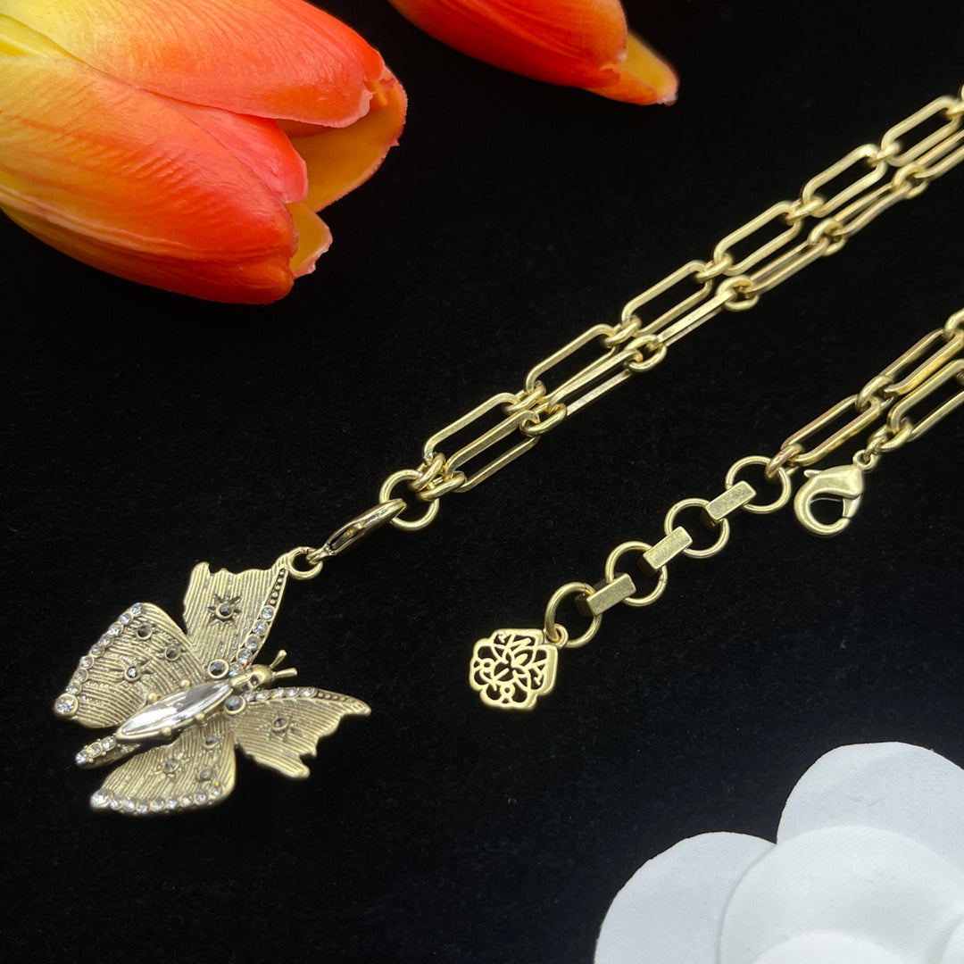 Alexander McQueen Butterfly Charm Chain necklace in Gold Tone, detail view 4