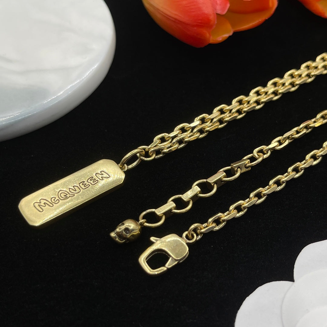 Alexander McQueen Engraved Bar Pendant necklace in Gold Tone, detail view 3