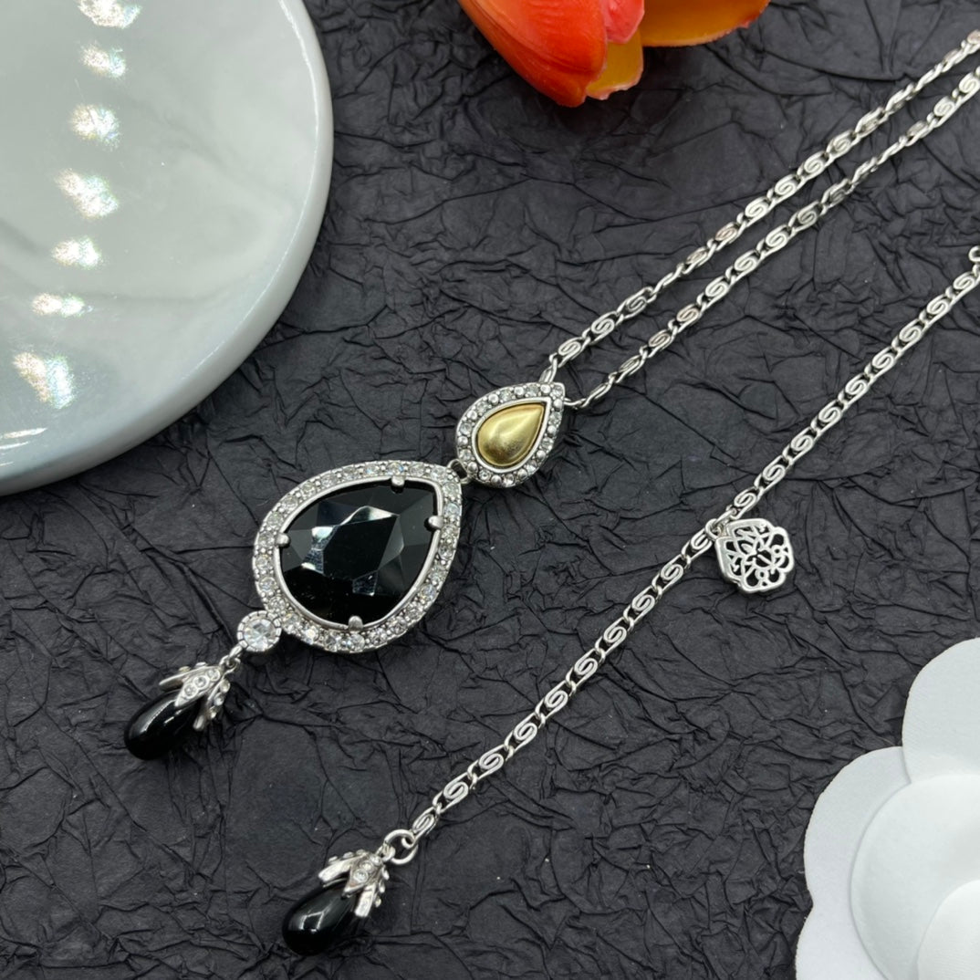 Alexander McQueen Oval Black Crystal Pendant necklace in Gold Tone, detail view 3