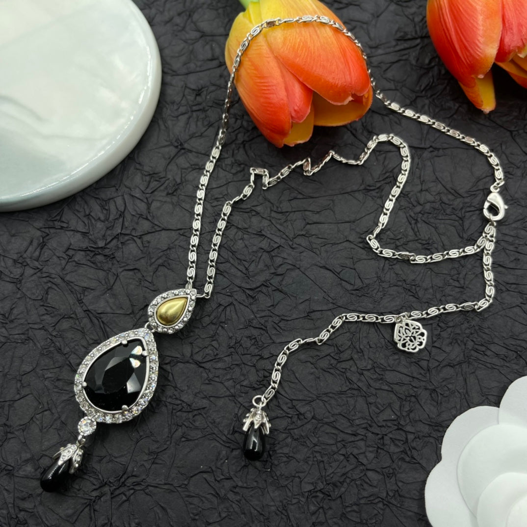 Alexander McQueen Oval Black Crystal Pendant necklace in Gold Tone, detail view 4