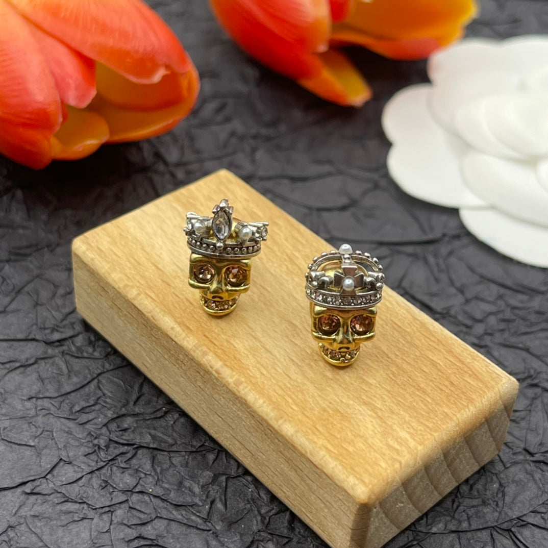 Alexander McQueen Mini Skull Stud earrings in Gold Tone, main view