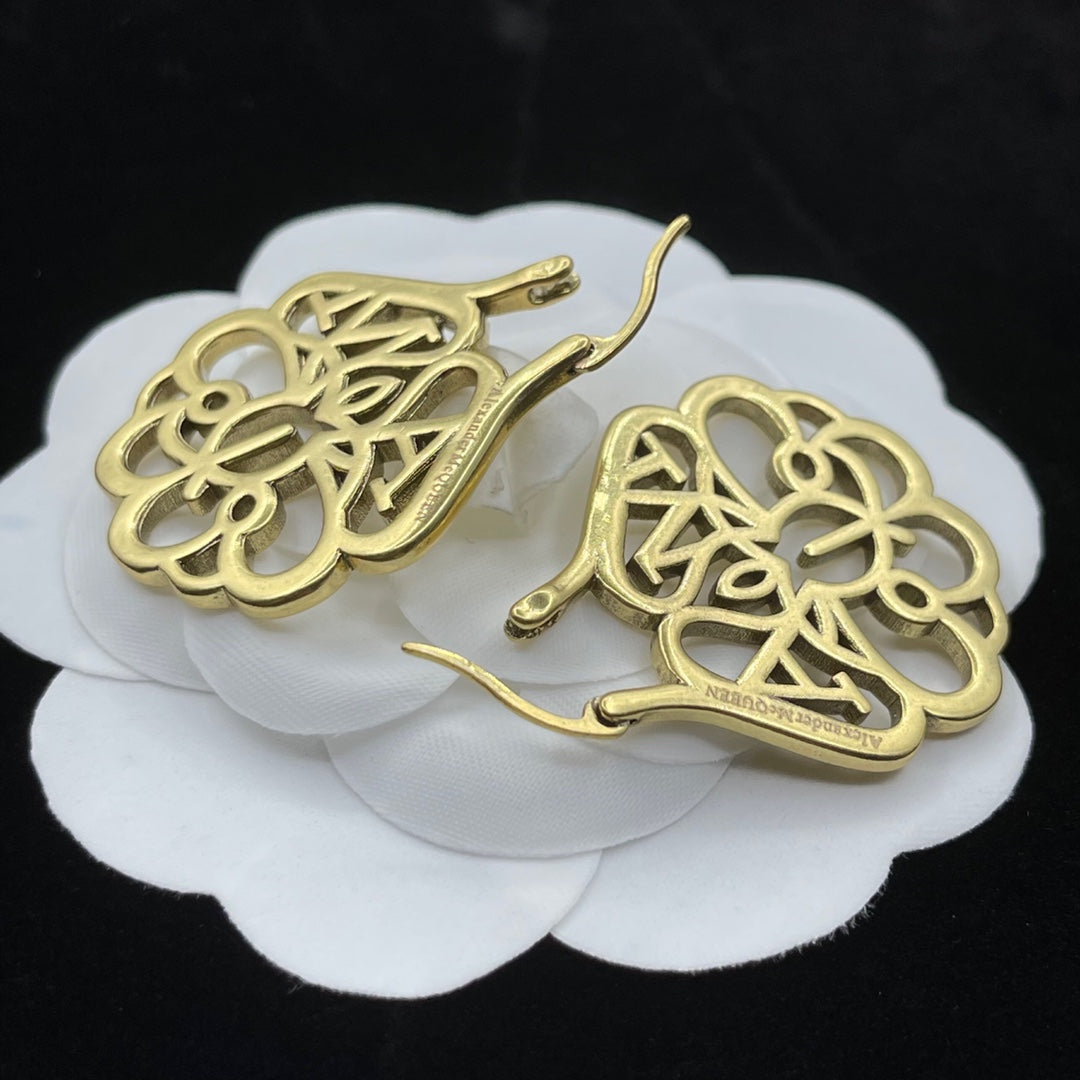 Alexander McQueen Filigree Monogram Stud earrings in Gold Tone, detail view 6