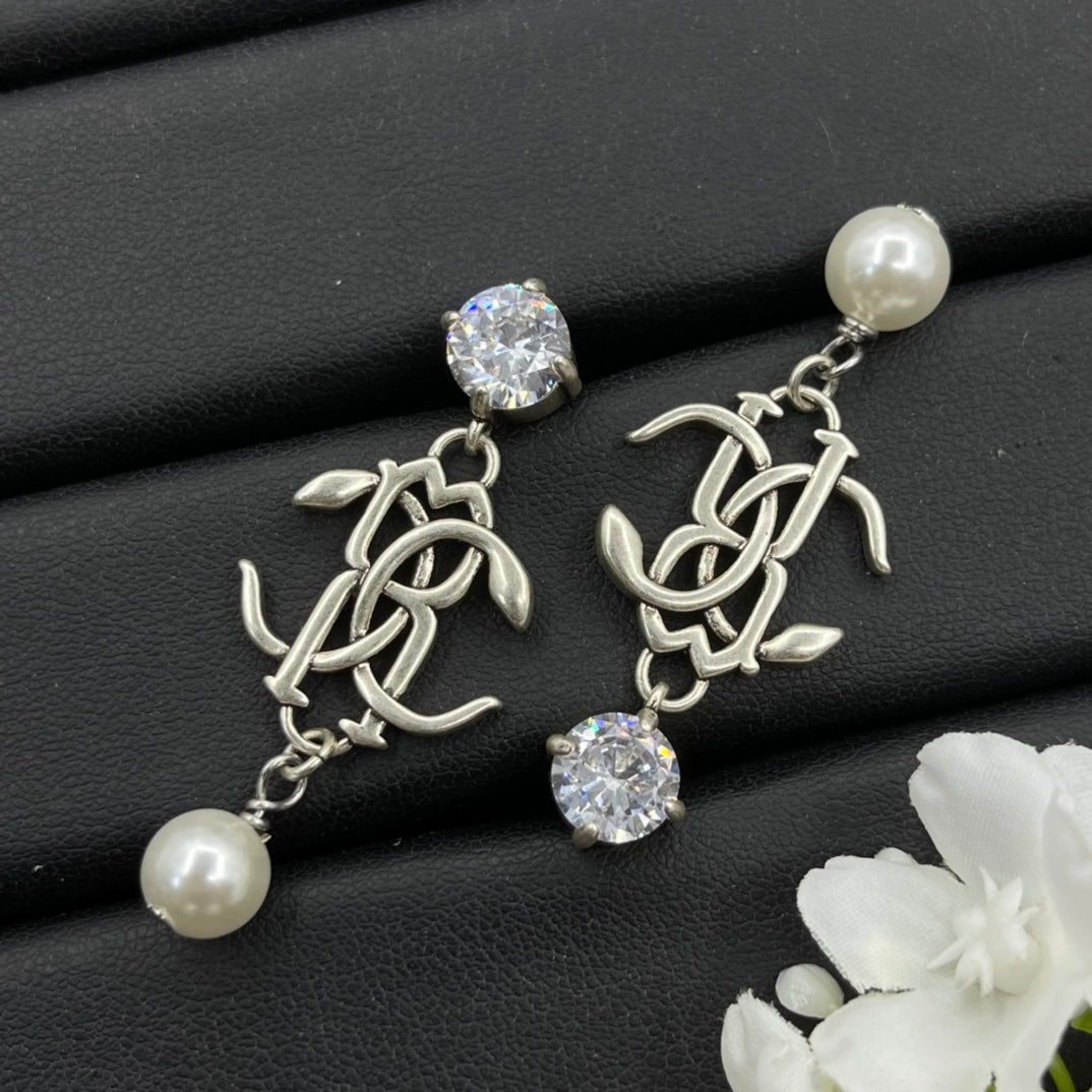 Alexander McQueen Monogram Pearl Drop earrings in Silver Tone, detail view 3