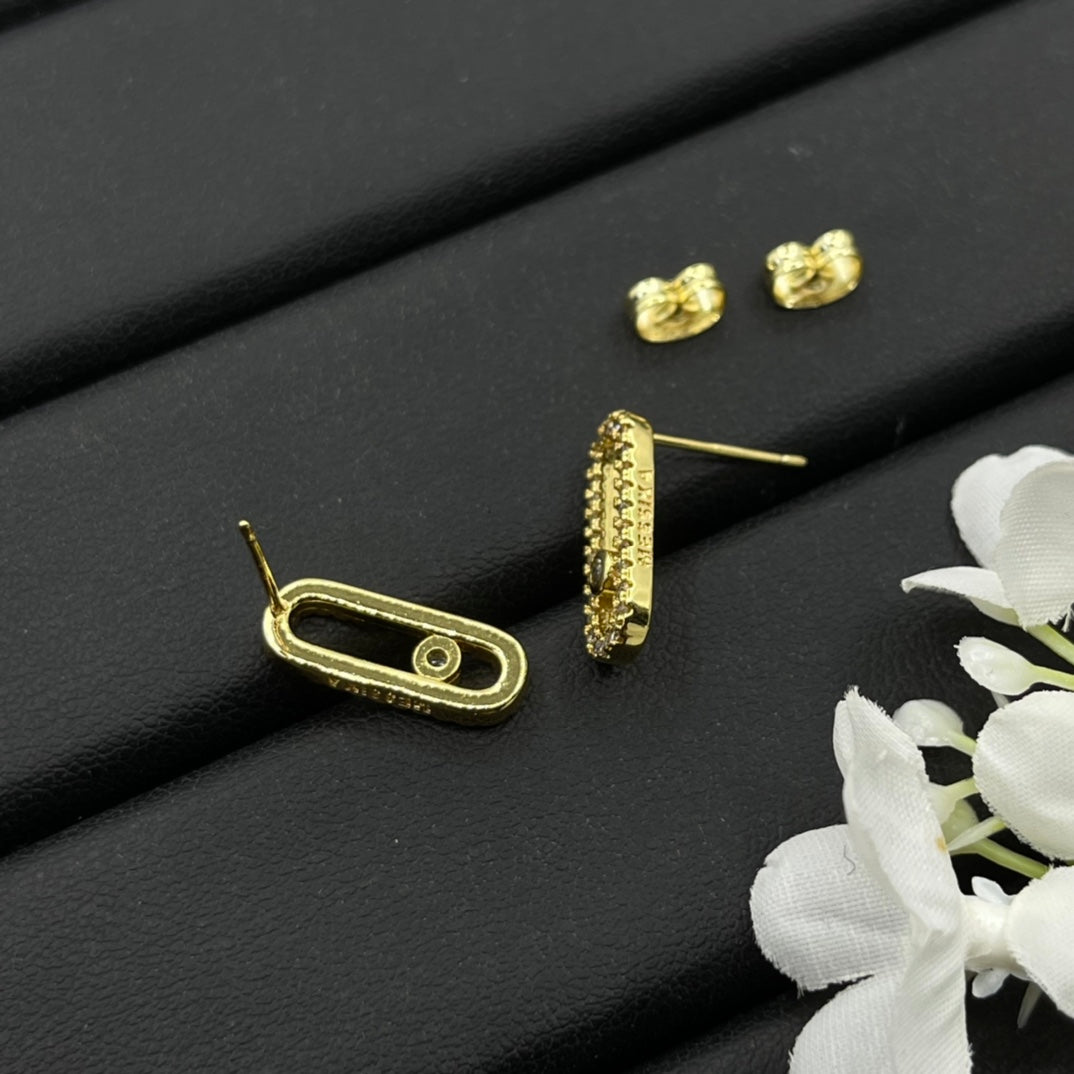 Messika Black Accent Link Stud earrings in Gold Tone, detail view 6