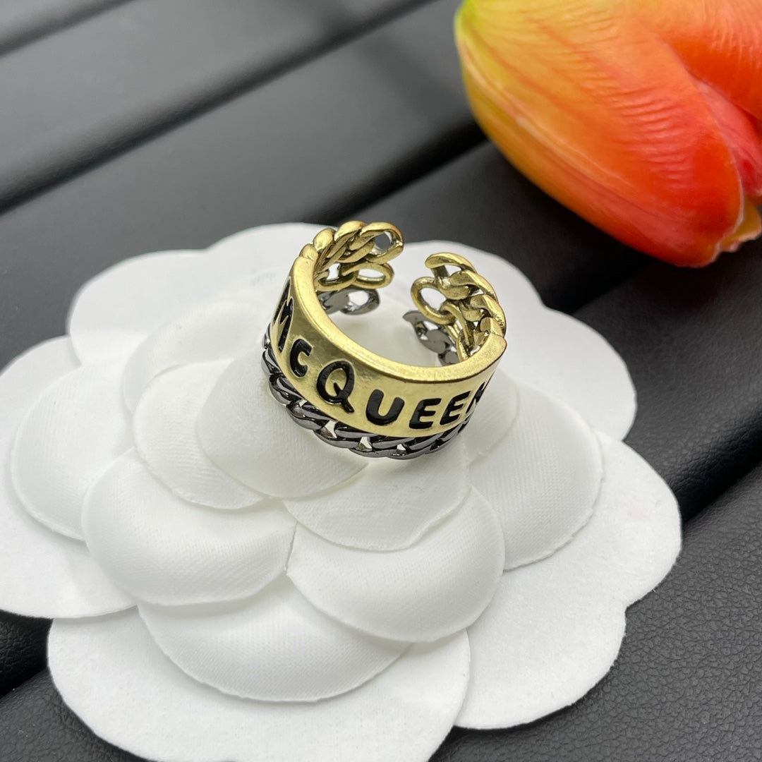 Alexander McQueen Engraved Logo Band ring in Gold Tone, detail view 4