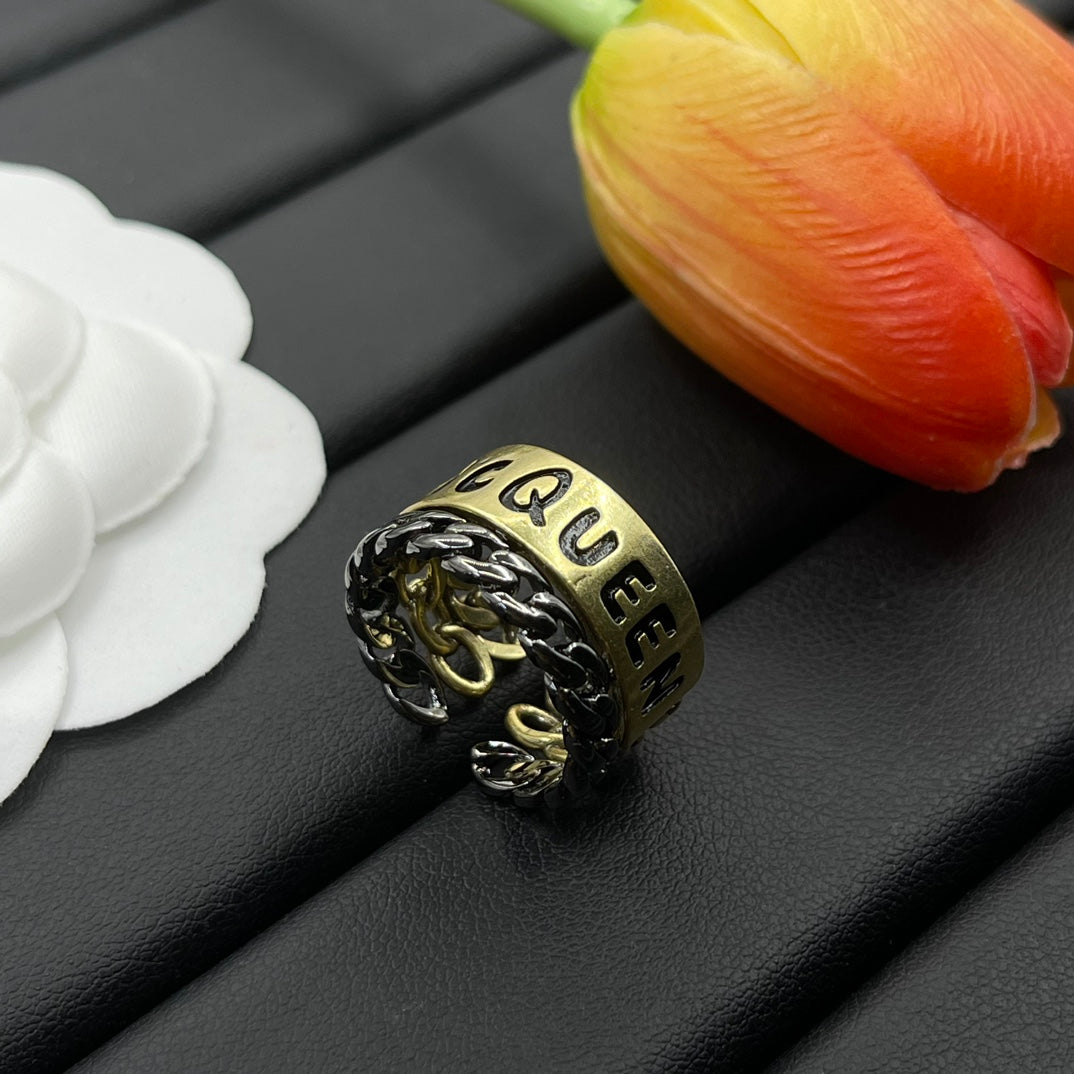 Alexander McQueen Engraved Logo Band ring in Gold Tone, detail view 3