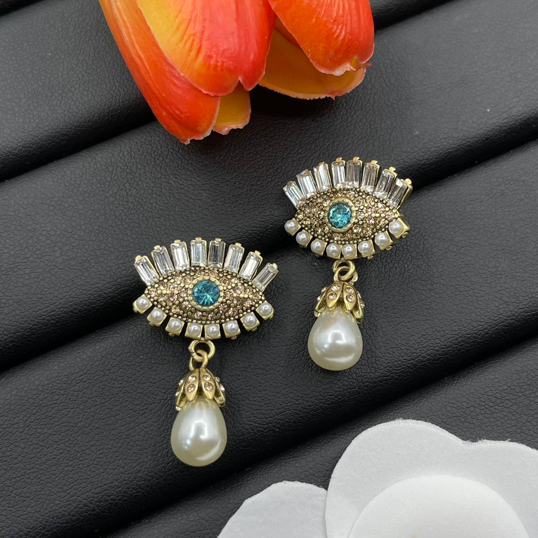 Alexander McQueen Crystal Eye Pearl Drop earrings in Silver Tone, detail view 2