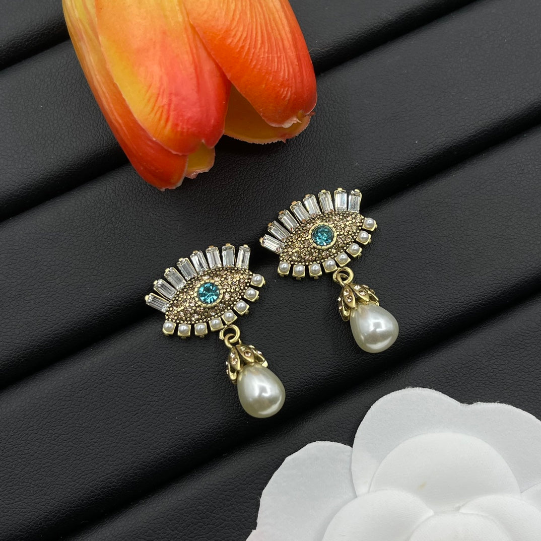 Alexander McQueen Crystal Eye Pearl Drop earrings in Silver Tone, main view