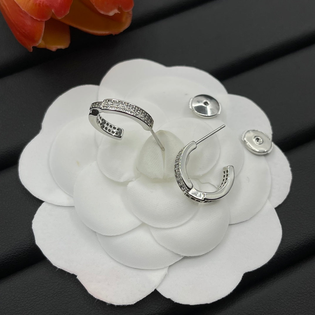 Chaumet pave huggie hoop earrings in Silver Tone, detail view 6