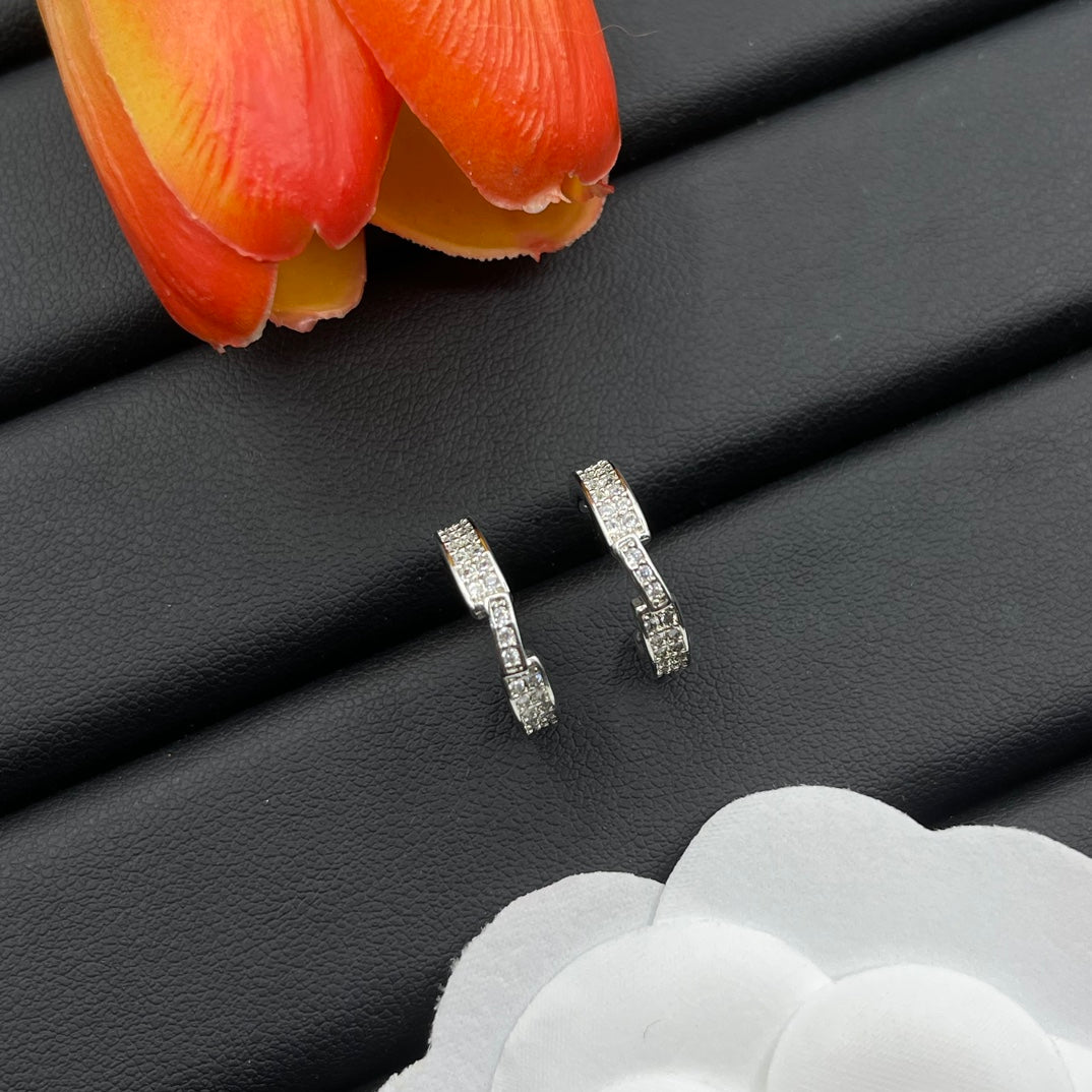 Chaumet pave huggie hoop earrings in Silver Tone, detail view 2