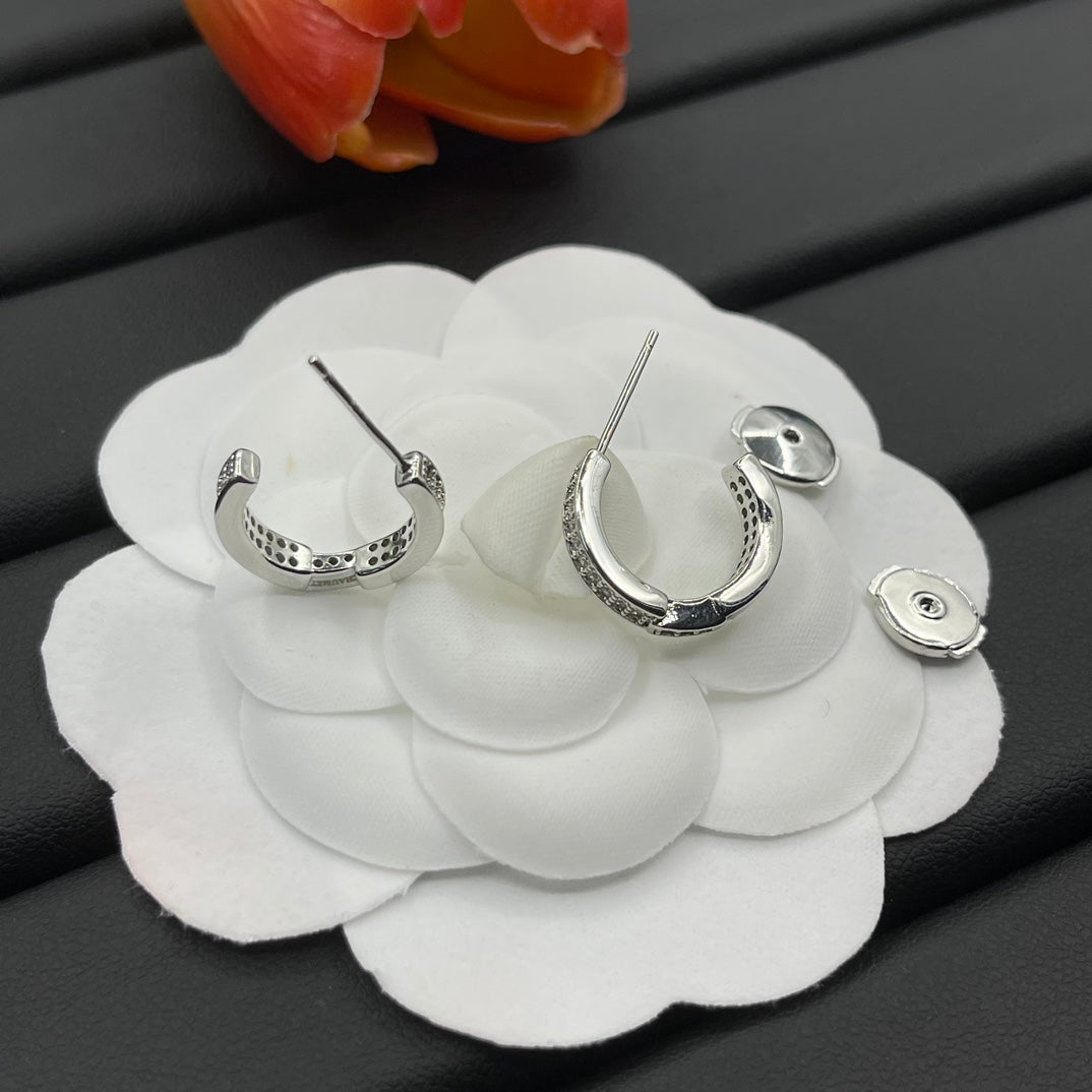 Chaumet pave huggie hoop earrings in Silver Tone, detail view 4