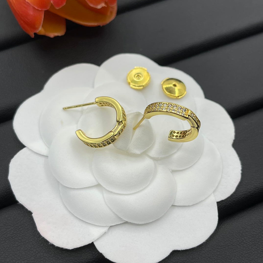 Chaumet pave huggie hoop earrings in Gold Tone, detail view 18
