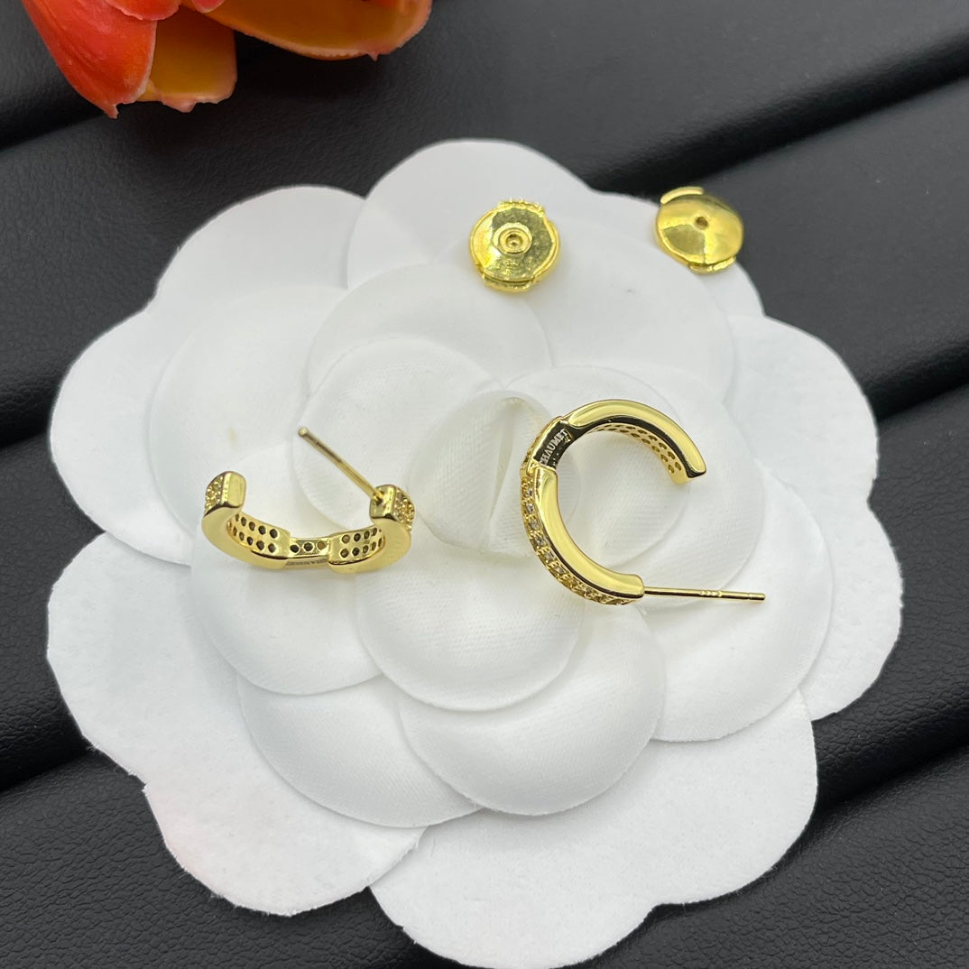 Chaumet pave huggie hoop earrings in Gold Tone, detail view 19